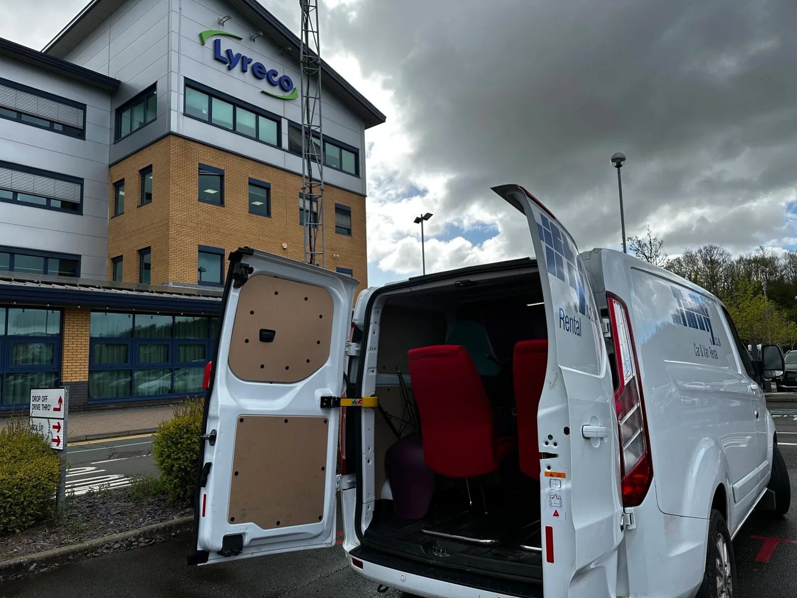   Chairs being loaded into Army van at Lyreco  