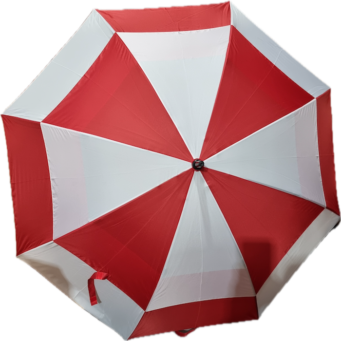 A red and white golf umbrella